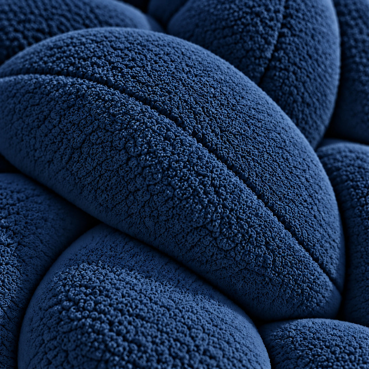 Tour de lit bébé tressé, coloris Bleu marine, macro de la texture du tissu